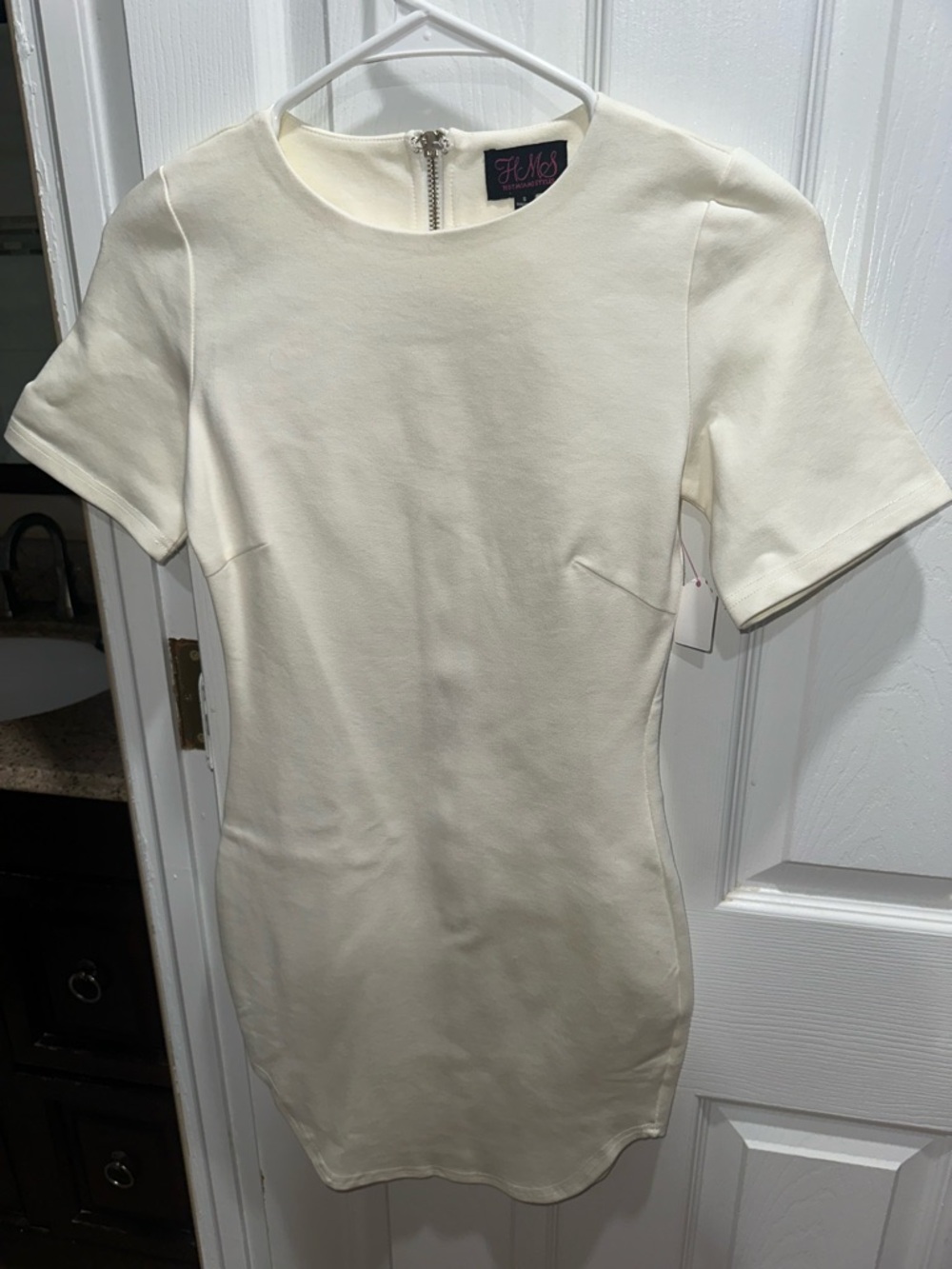 Hot Miami Styles Cream Sleeveless Sheath Dress